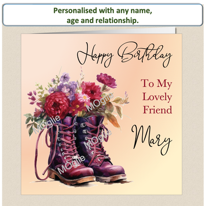 Floral birthday card. Brown walking boot brimming with red flowers.
