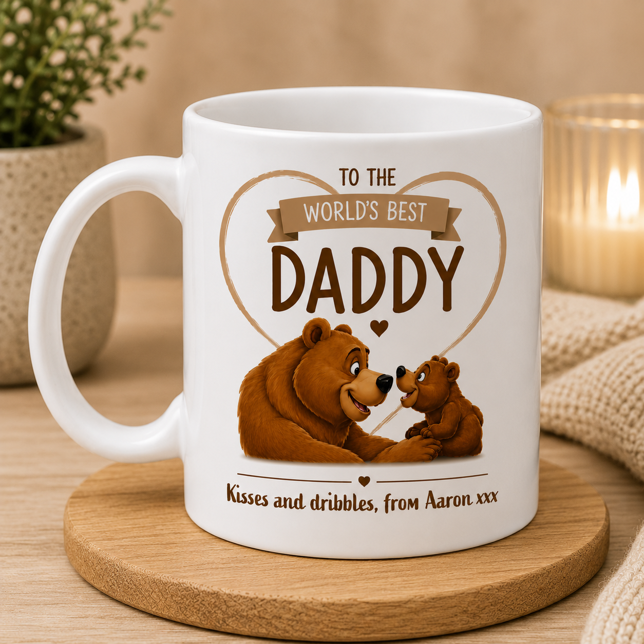 White mug with bear design and text on a wooden coaster