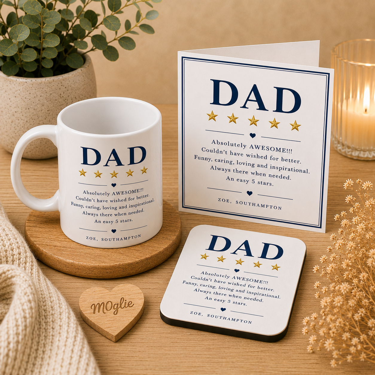 Mug, card, coaster, and heart-shaped sign on a wooden surface with decorative elements.
