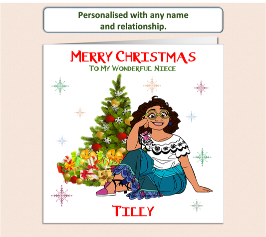 Disney Mirabel from Encanto sat next to a Christmas tree