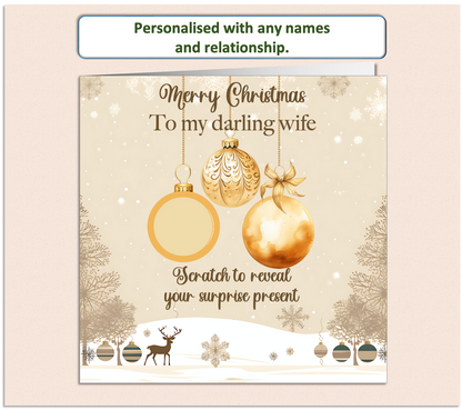 gold bauble Christmas card, with on having a scratch to reveal panel hiding details of a surprise present.